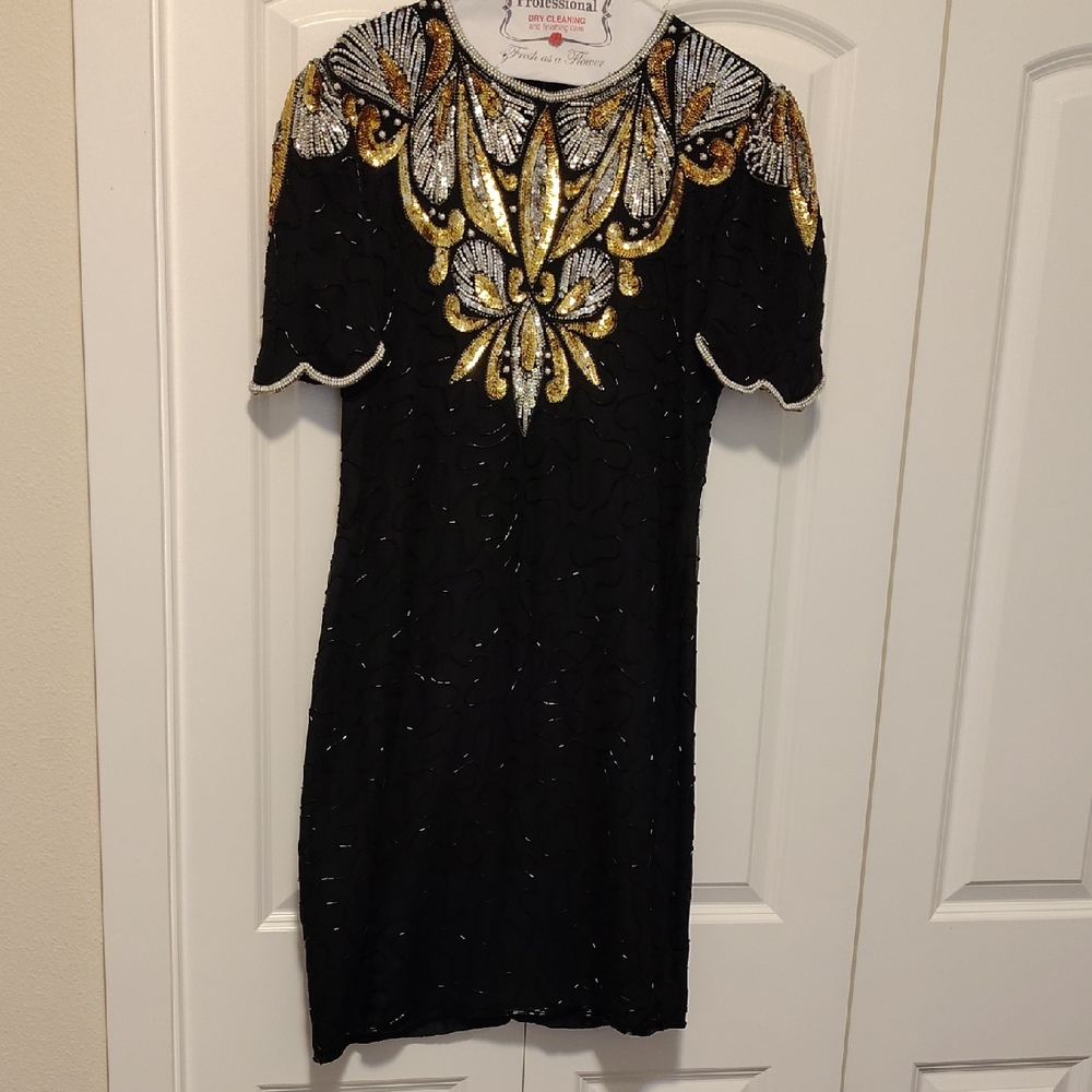 Elegant Black Dress with Gold and Silver Embellishments